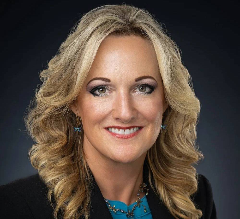 Trustee Peschek smiling