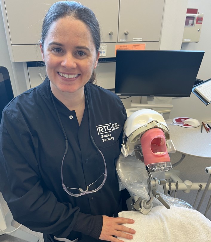 Emilee Woods and a dental training dummy