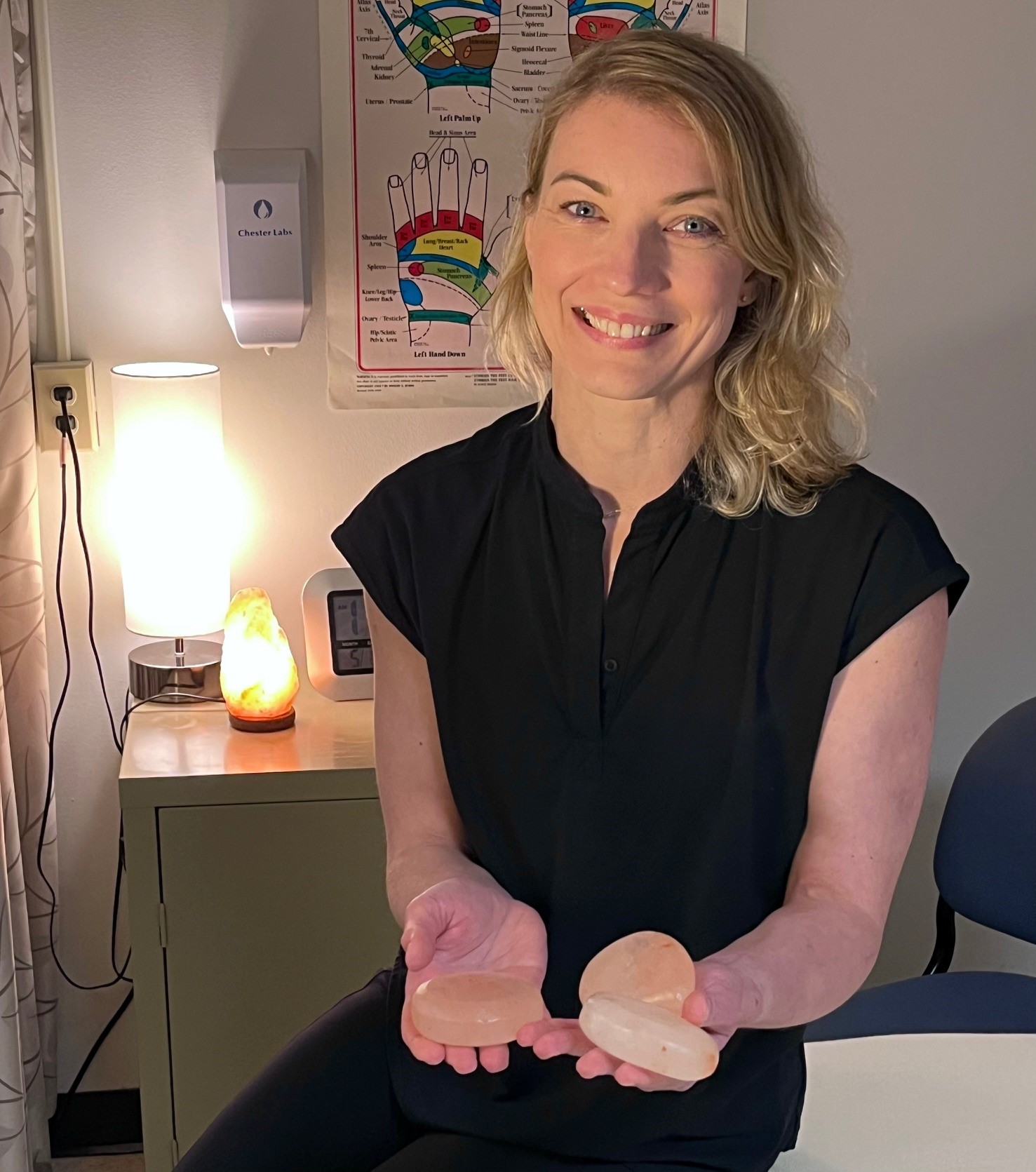 RTC Foundation scholarship recipient, Marina Sadovnikova prepares her hot stones for therapeutic massage practice in RTC’s massage therapy lab.