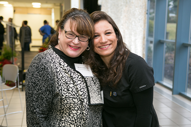 Photo of Michele Lesmeister and Sarra Ghezzaz, former ESL student who is about to graduate as a dental assistant.