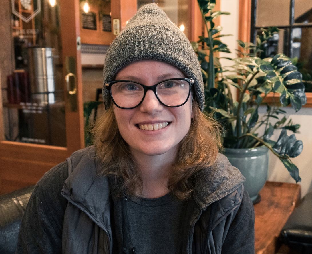 Smiling Land Surveying student with glasses