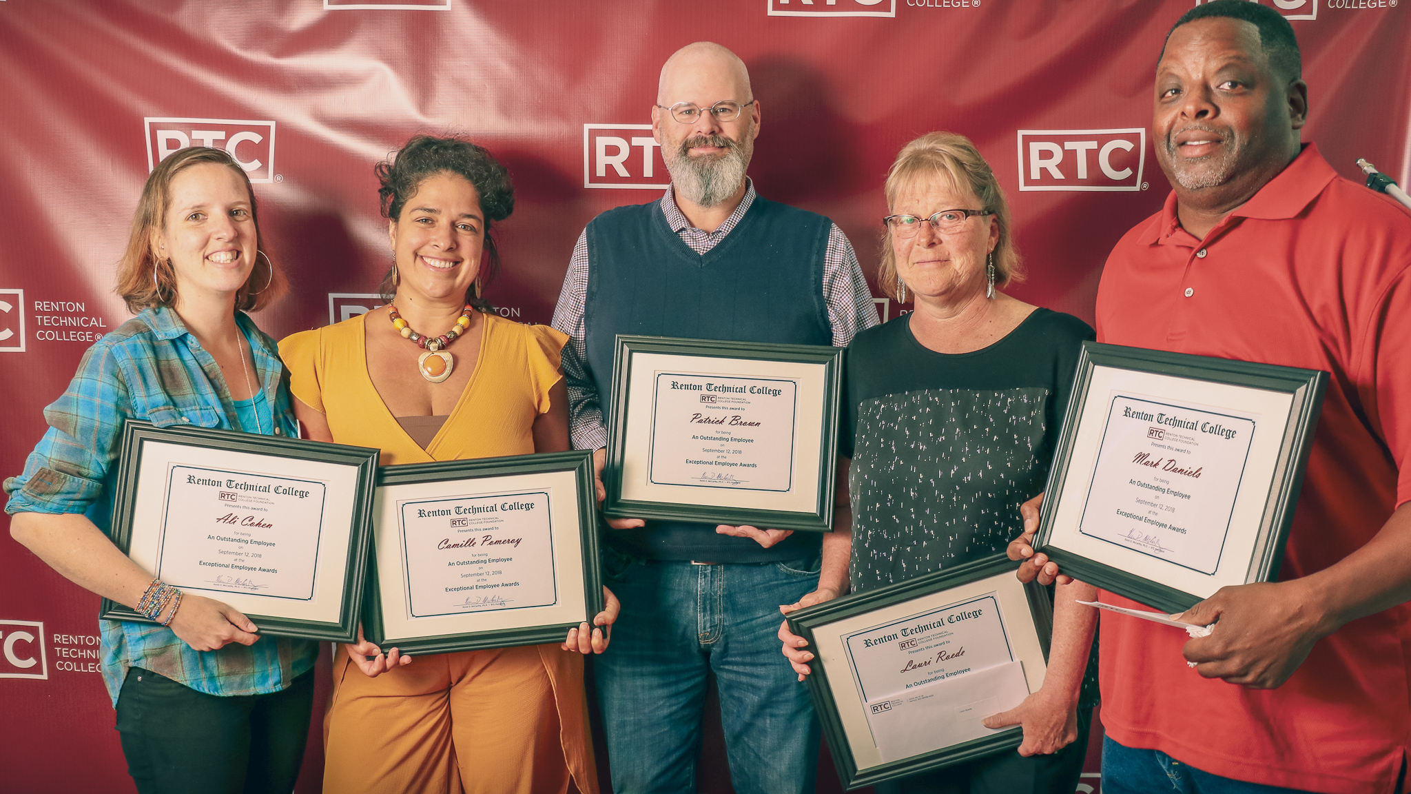 Six RTC 2018 Exceptional Employees with their certificates.